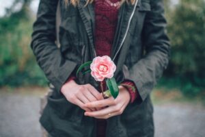 Person Buying Flower