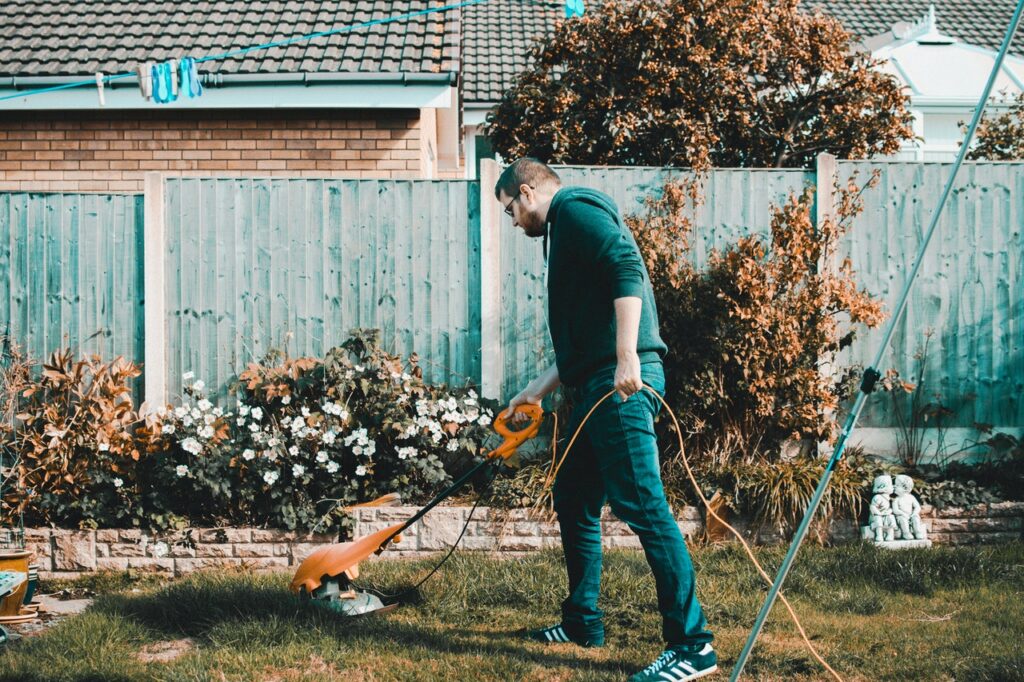 Man Landscaping and doing lawn maintenance